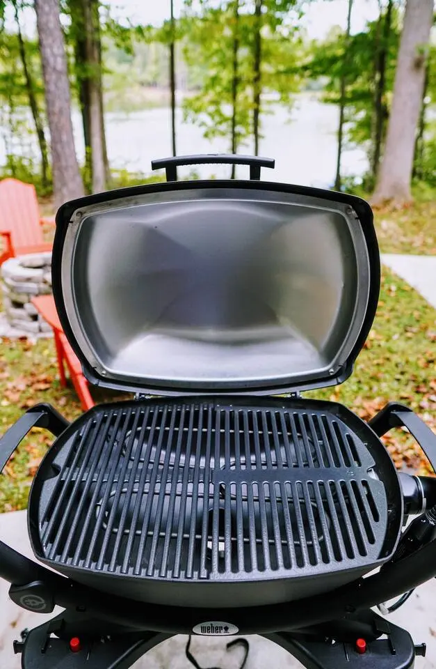 Outdoor grill on the back deck with Mayo Lake in the background