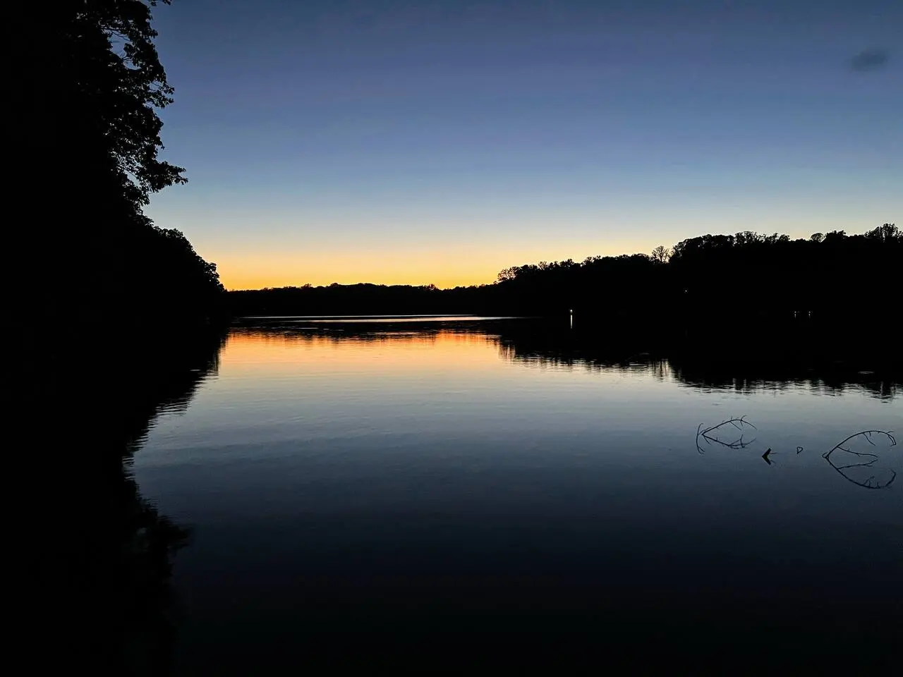 Mayo Lake glowing at twilight seen from the private dock